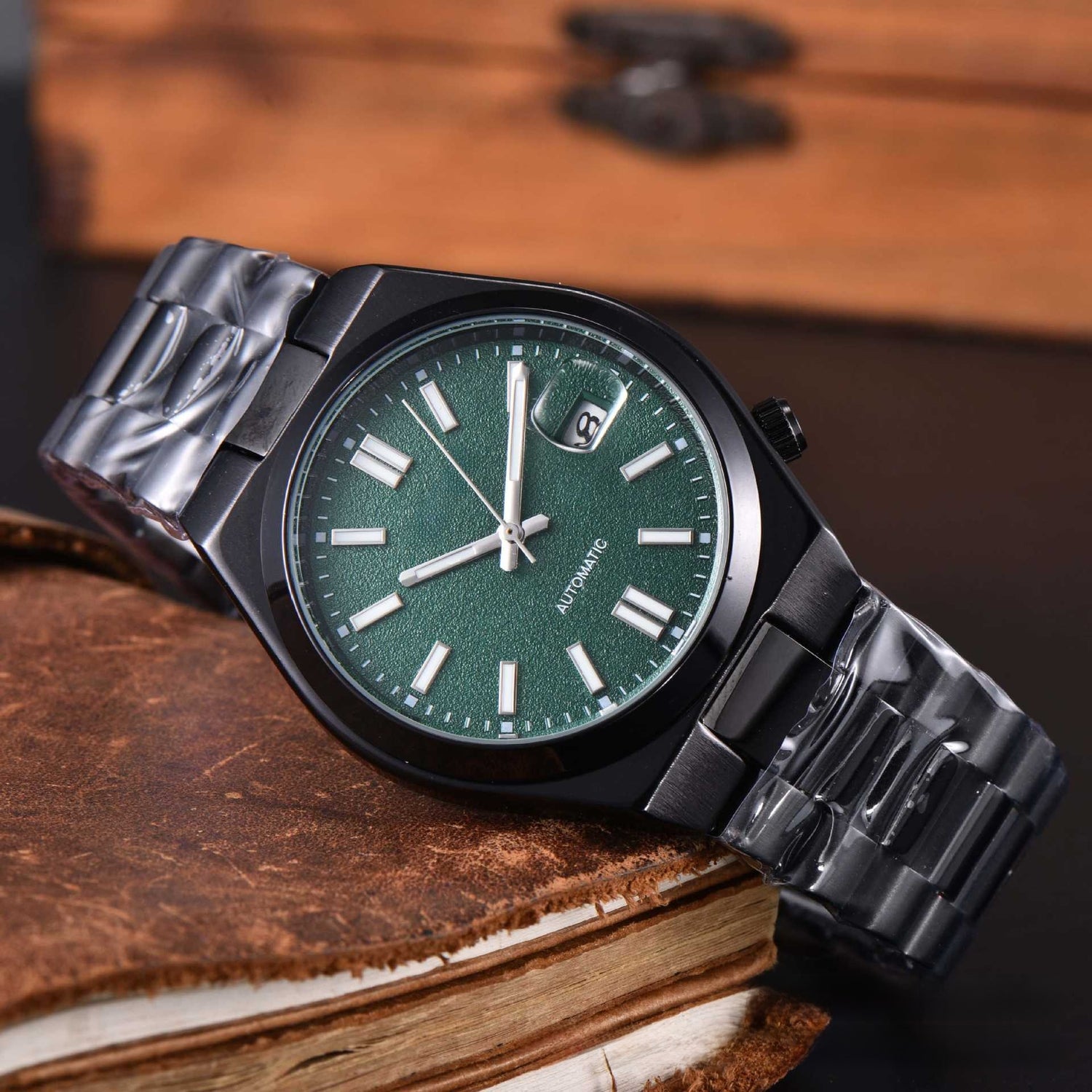 Automatic mechanical watch worn on a wrist in a lifestyle scene
