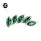 Curved marquise cubic zirconia top of a titanium piercing stud in close view