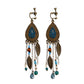 Bohemian vintage clip-on tassel drop earrings on a zinc alloy frame, handmade boho pair on white studio background