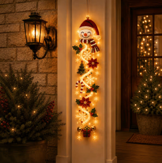 Snowman Christmas door hanger with red hat and scarf, glowing light strands on a porch pillar, Snowman option