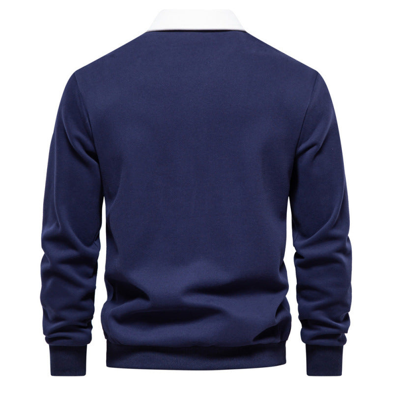 Long sleeve polo collar pullover worn under an open coat as a layer