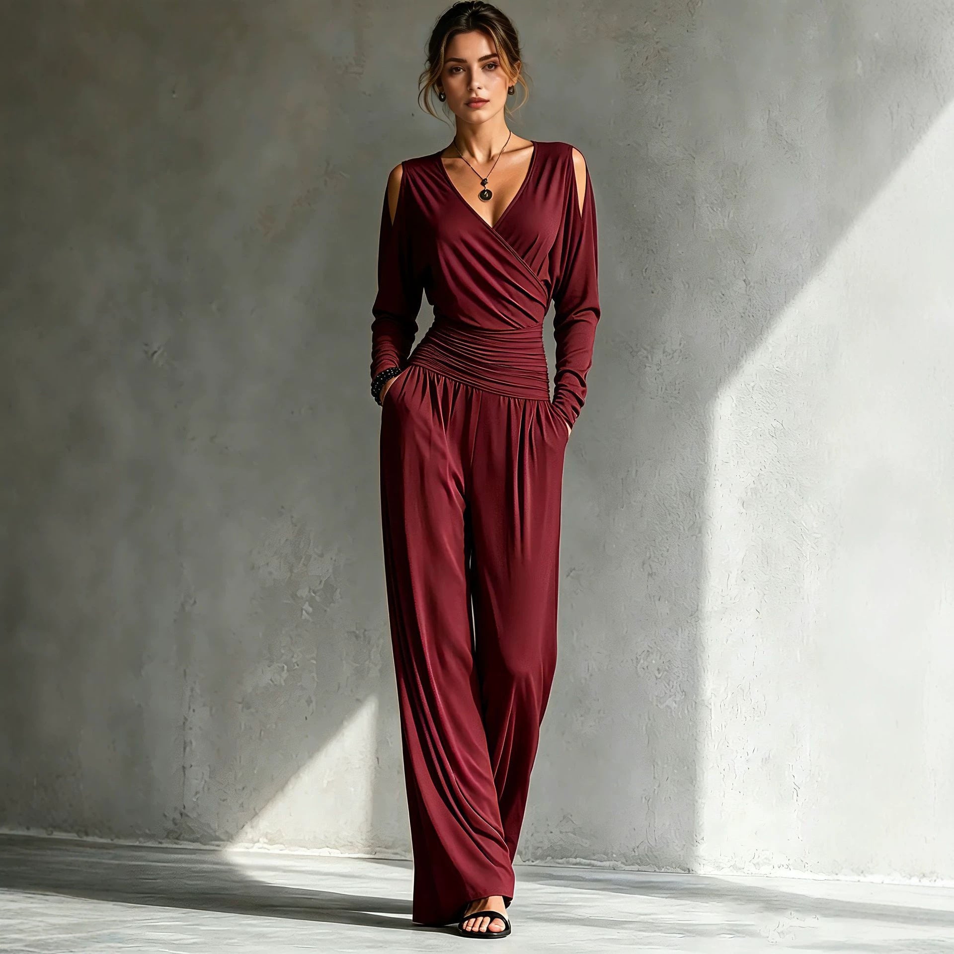 Full-length silhouette of the milk silk knit wide-leg jumpsuit
