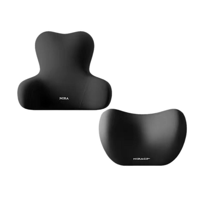 Black lumbar back cushion and rounded neck headrest pillow set on white