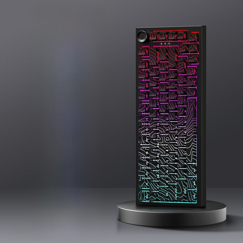Black Contour option, black keyboard with topographic line keycaps lit in red, purple and cyan on a stand
