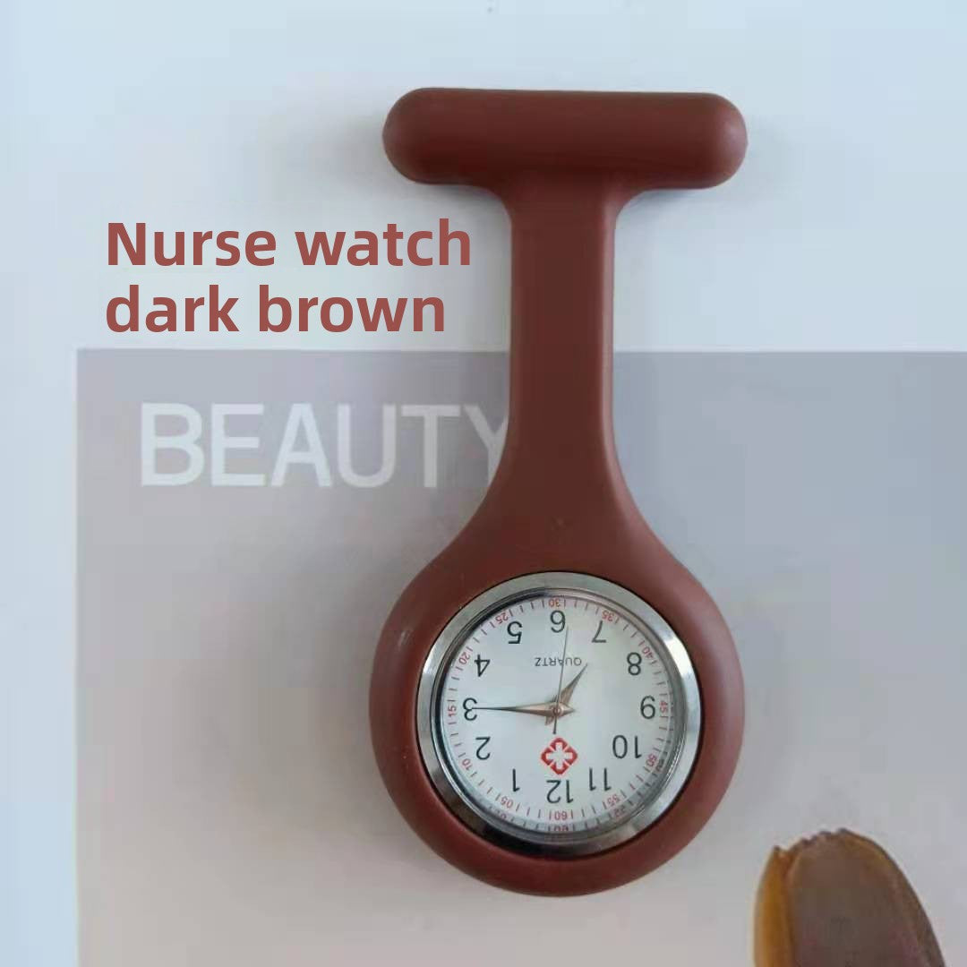 Cyan silicone nurse fob watch with a quartz analog face behind a glass crystal