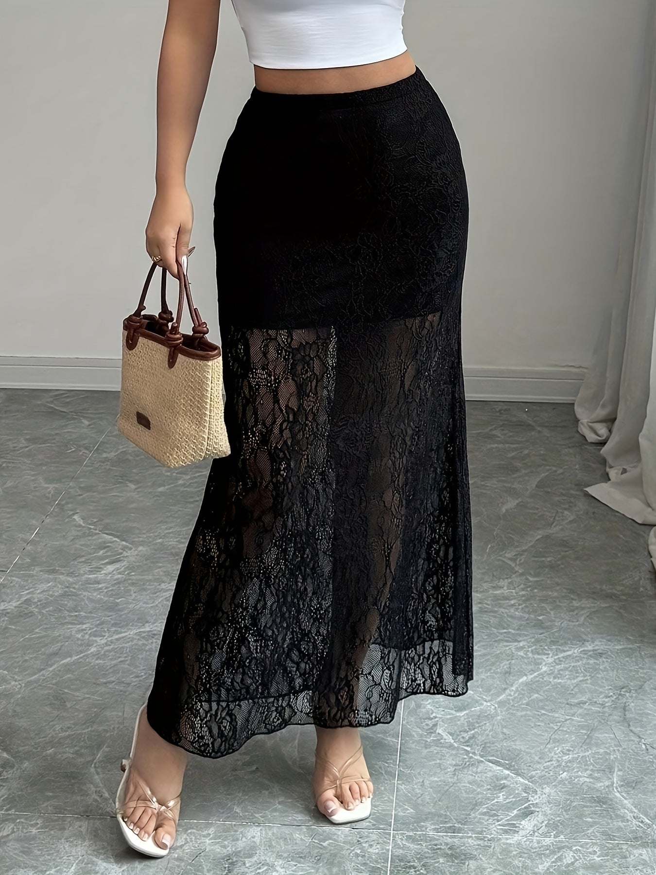 Black lace maxi skirt with a lined top and sheer lace lower half