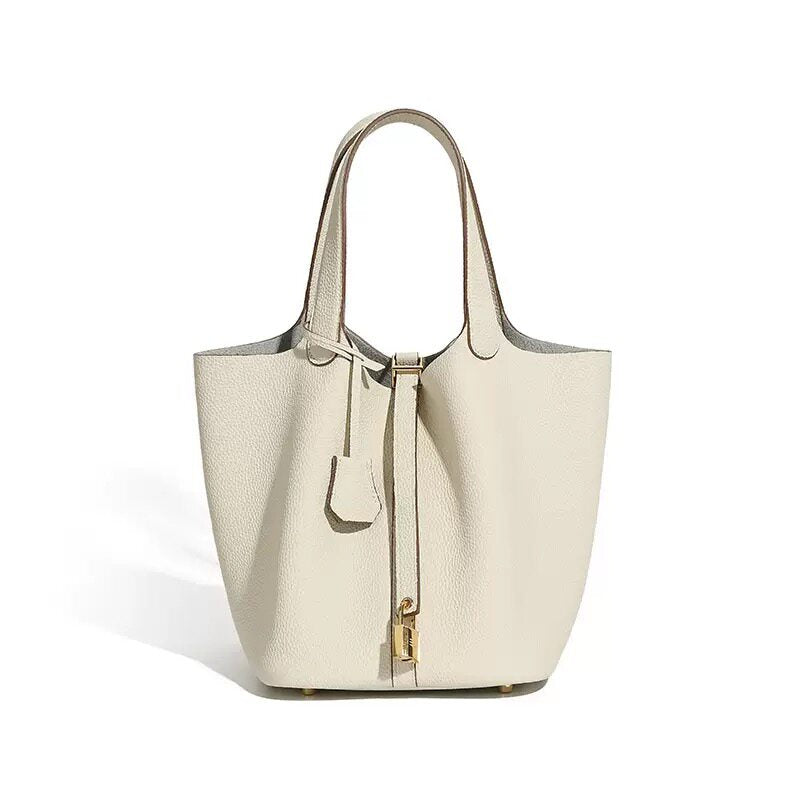 Wide feature view of the leather bucket tote bag full body
