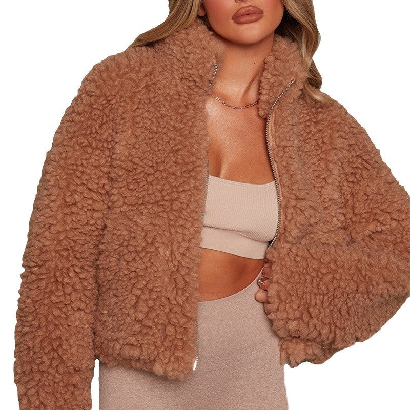 Camel teddy fleece jacket worn open with a cropped loose fit