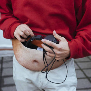 Funny dad belly fanny pack with the top zip open showing the roomy nylon lined pouch