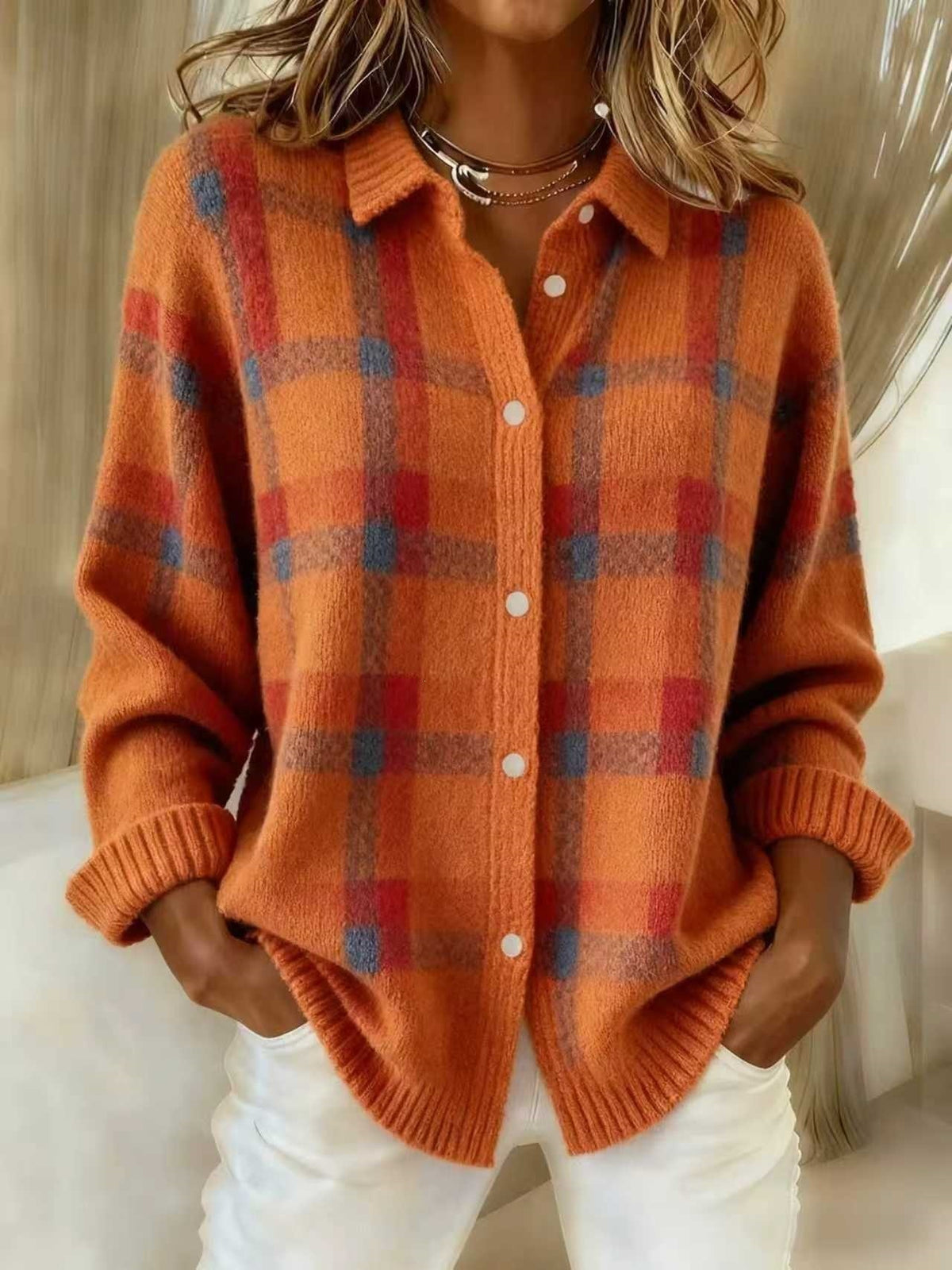 Orange option photo of an orange knit cardigan with a red plaid check, shirt collar, size XL