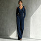 Wrap V-neck bodice of the jumpsuit with open cold-shoulder cutout at the shoulder