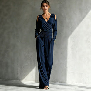 Wrap V-neck bodice of the jumpsuit with open cold-shoulder cutout at the shoulder