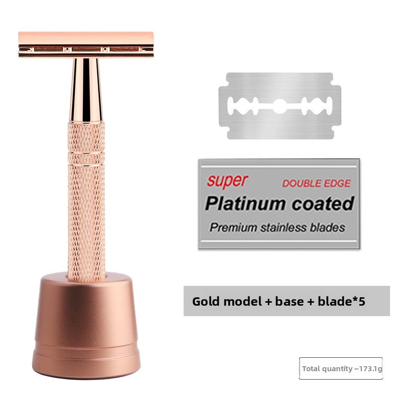 Rose gold safety razor on a matching weighted drip stand with five spare blades