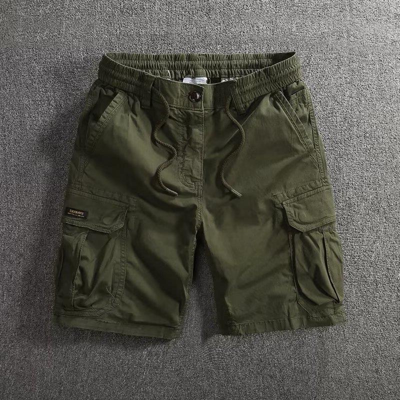 Men's loose fit cargo shorts shown flat with slant hand pockets and side cargo flap pockets