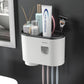 Open top tray storing skincare bottles, a comb and a razor at the sink