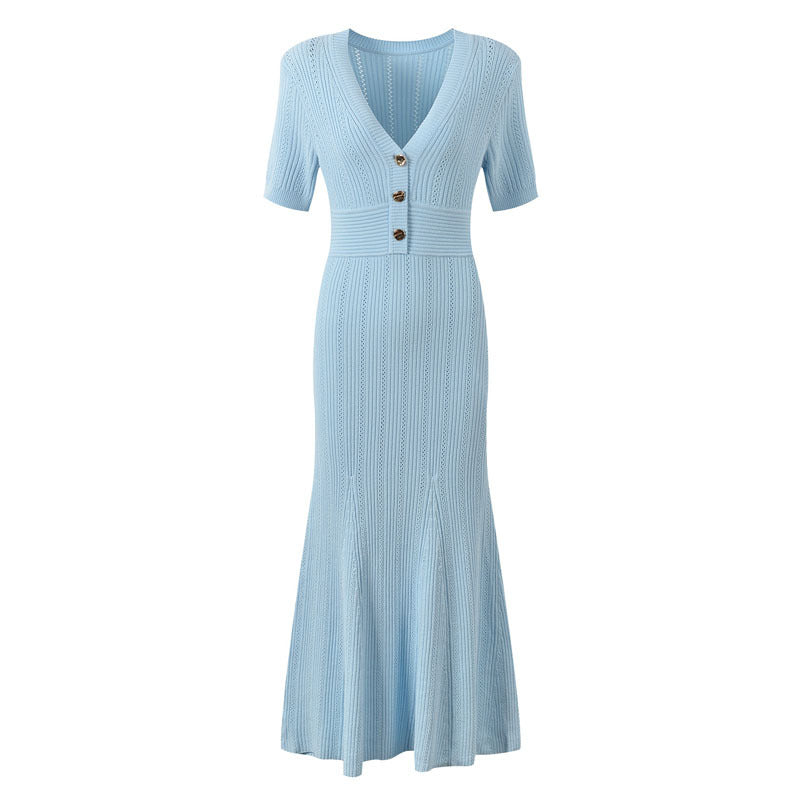 Elegant V-neck knitted dress laid flat to show the full shape