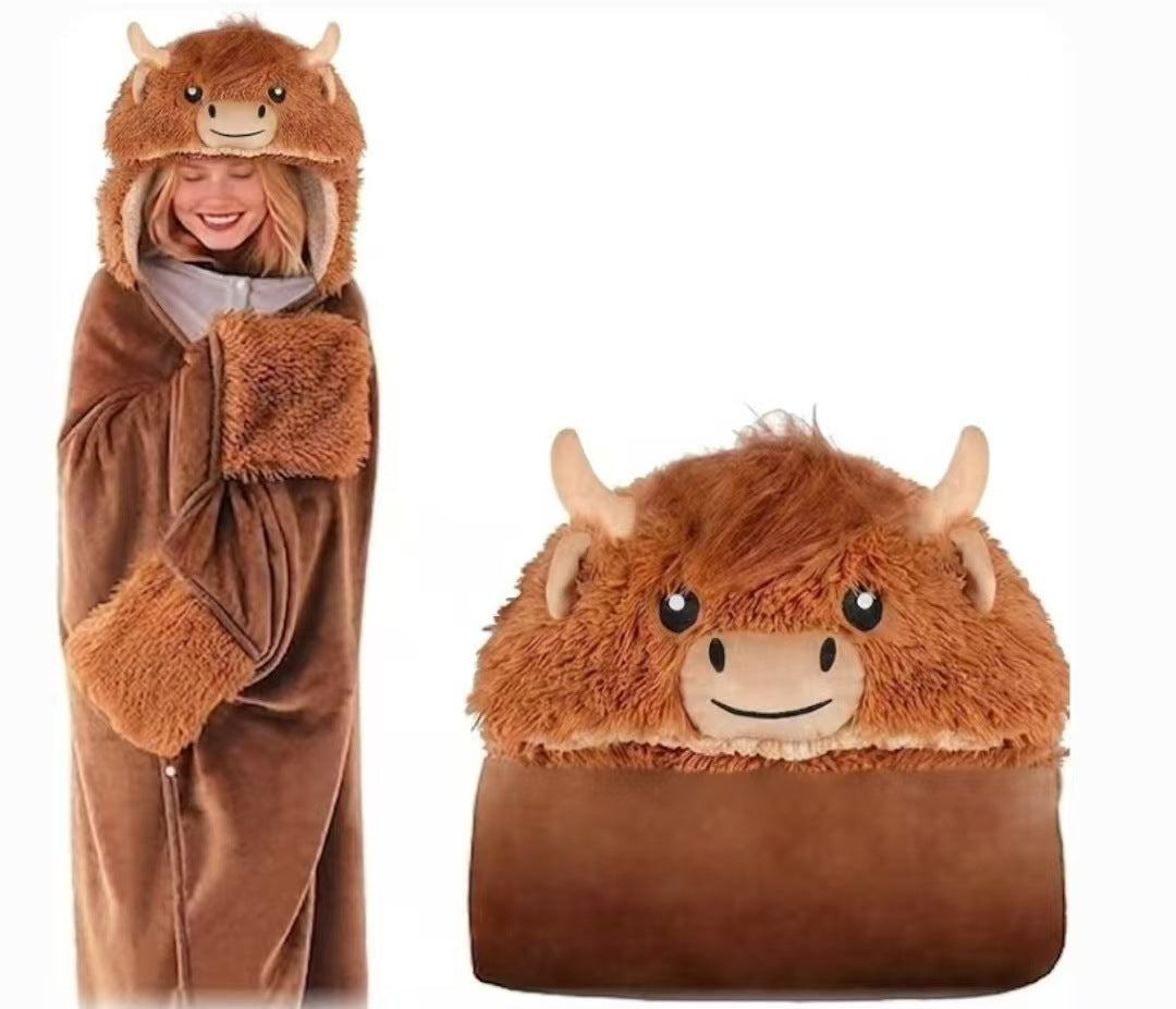 Plush animal face hood detail on a soft flannel hooded cape blanket
