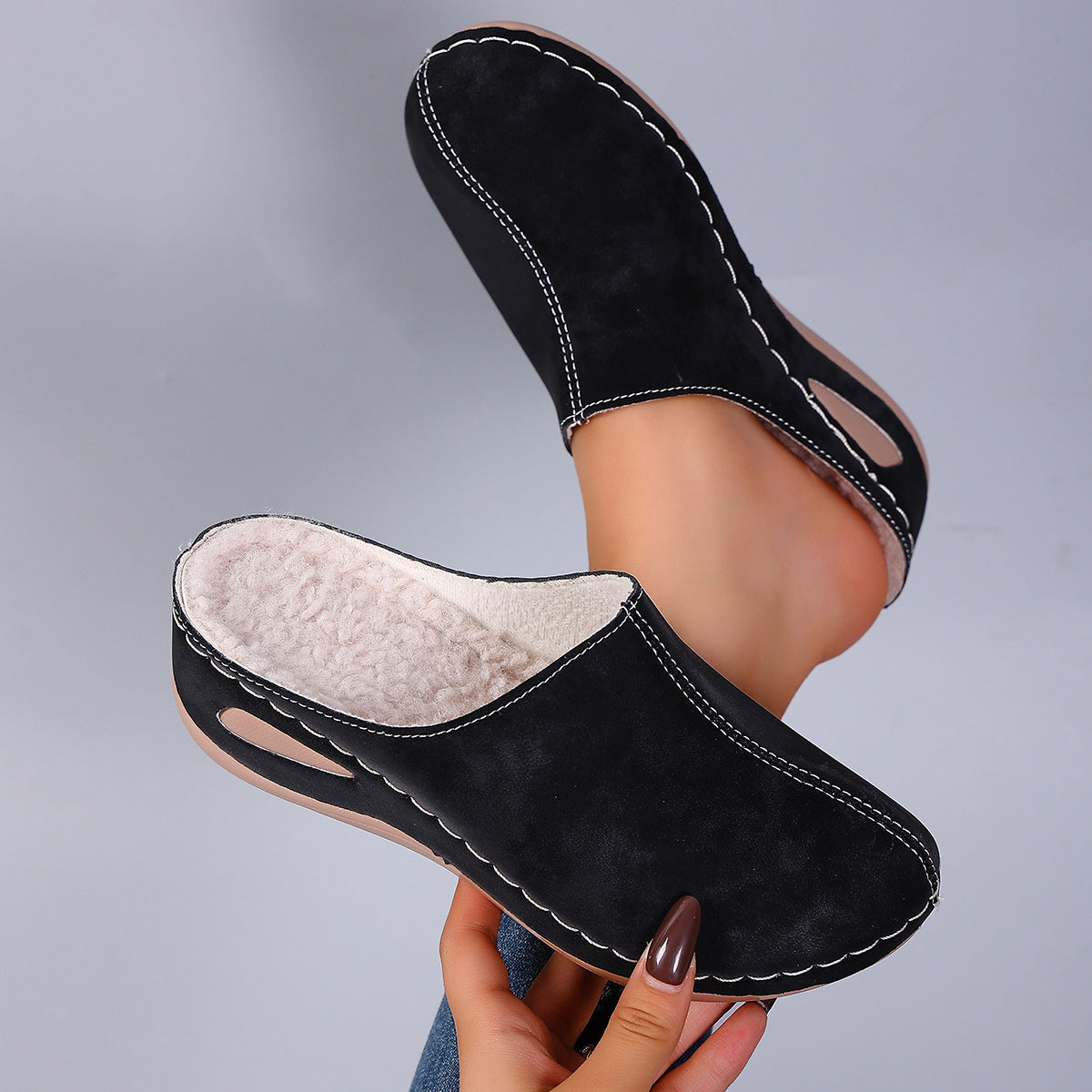 Black womens fleece lined slip on mule with closed round toe and low wedge sole, product photo