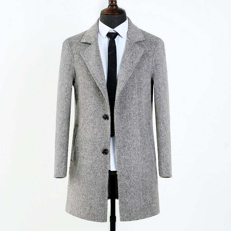Feature close up detail of the herringbone weave and lapel on the overcoat