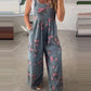 Sleeveless wide-leg printed jumpsuit front view on model