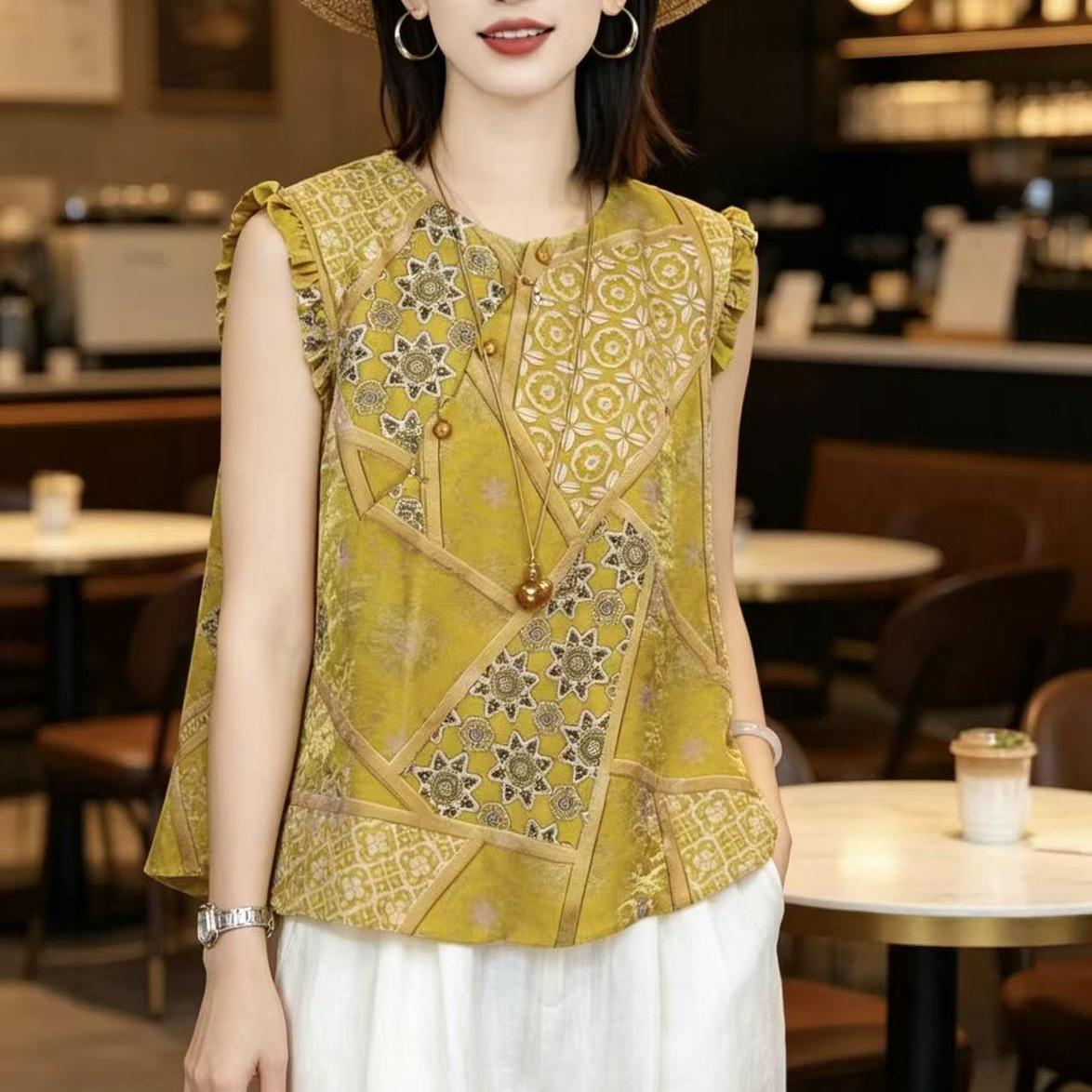 Close front of jacquard blouse showing round neck and side button placket