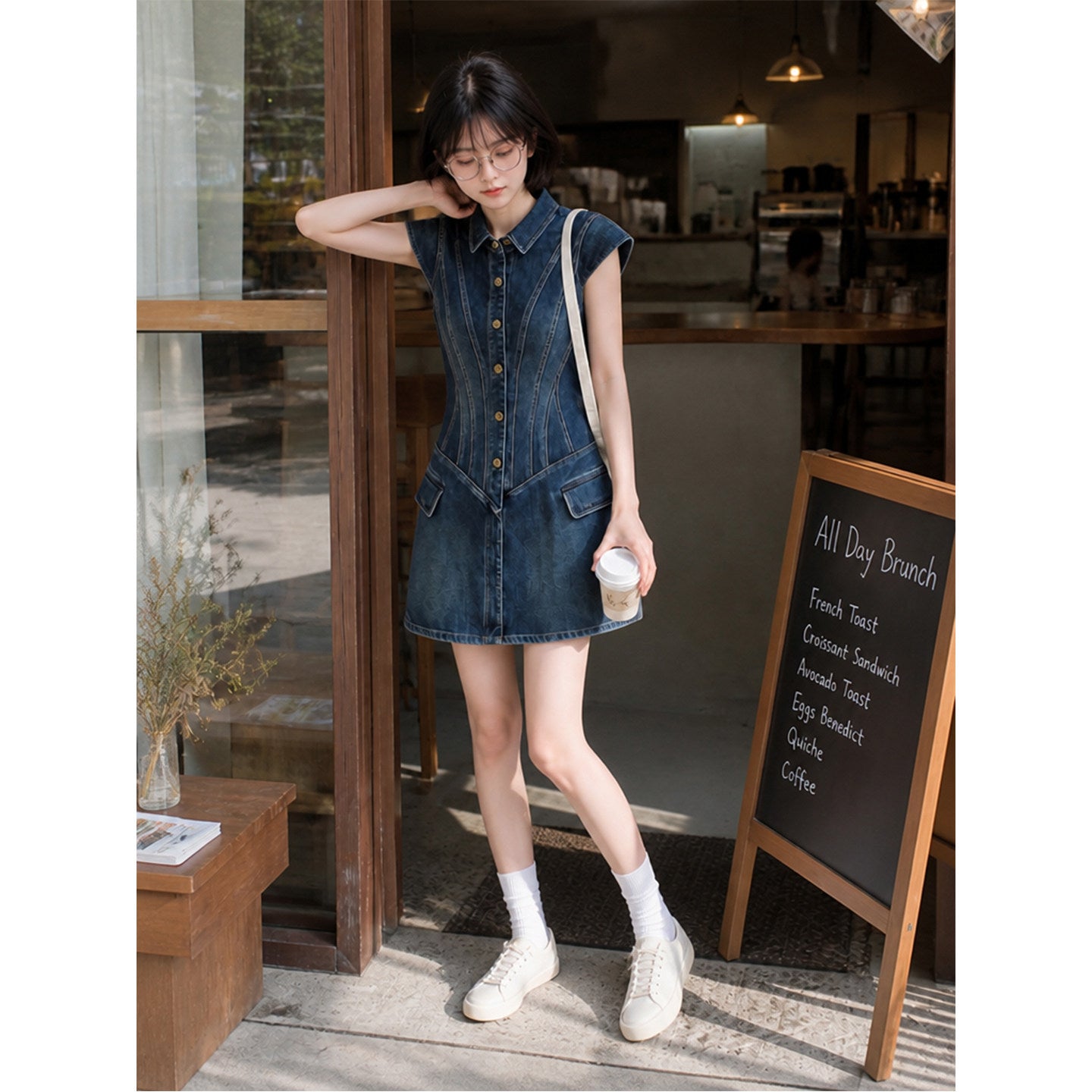 Fitted denim shirt dress showing button placket and flap pockets at the hip