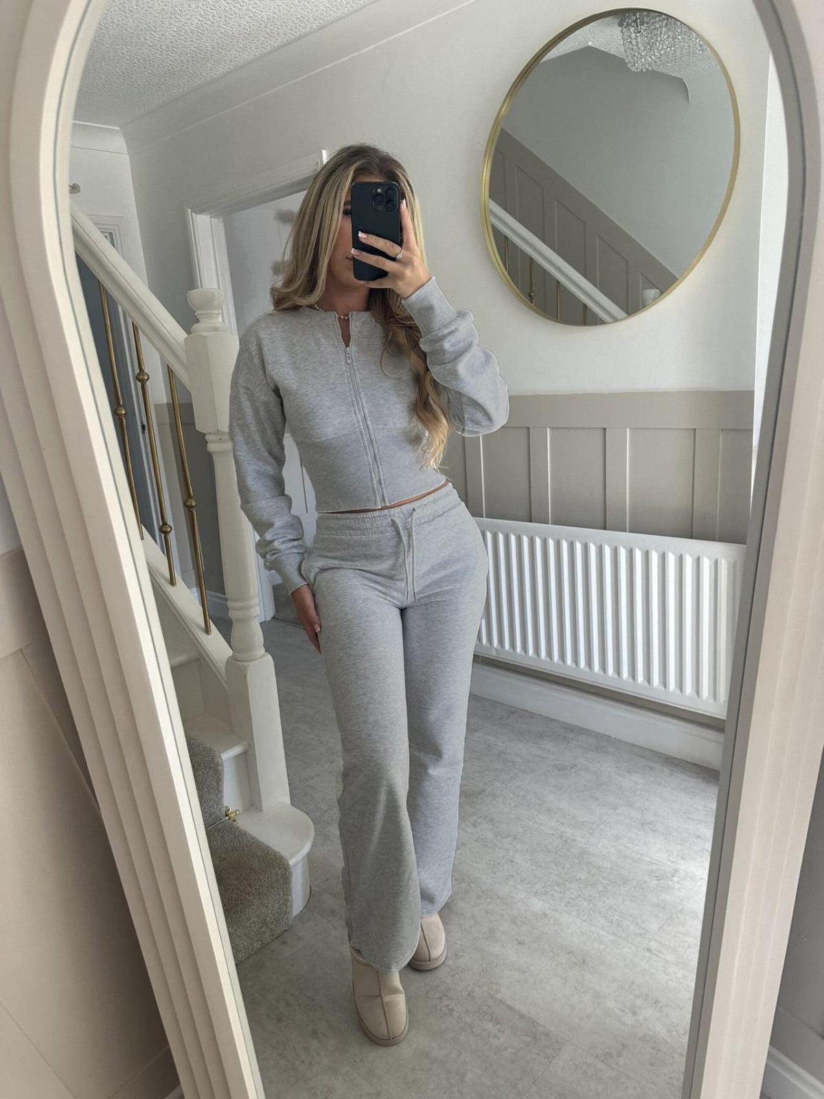 Womens two piece lounge set, a front zip jacket and straight leg drawstring pants in a soft sweat knit