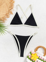 Low-waist bikini set worn on a sunny pool deck