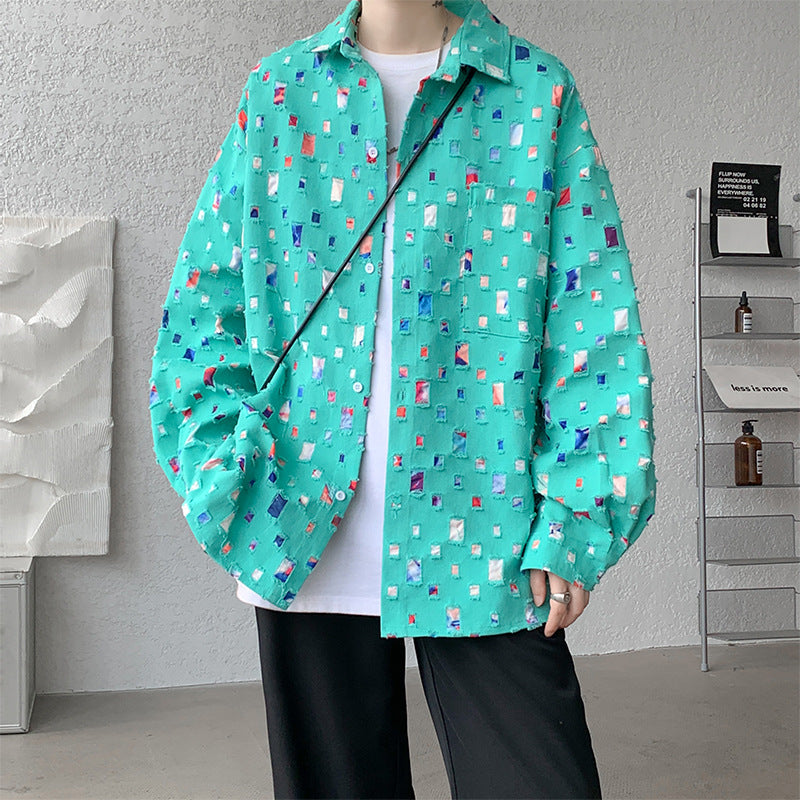 Distressed button shirt with frayed squares showing flecks of colour, loose oversized cut