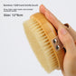 Hand holding the Moso bamboo 1208 hard bristle body brush with a bamboo base, with a caption of 12 by 8 cm