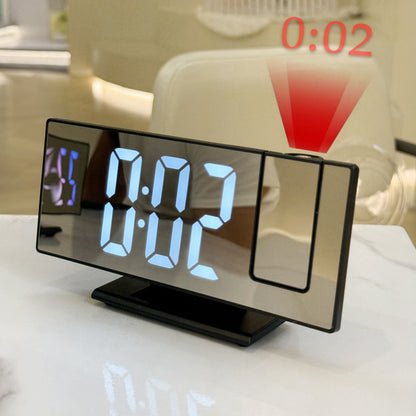 Mirror faced LED projection alarm clock showing white digits and red ceiling projection
