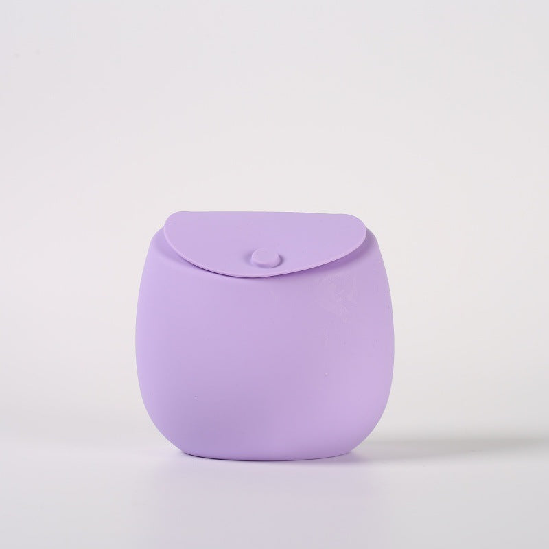 Silicone dog treat pouch open to show the soft flexible inside for treats