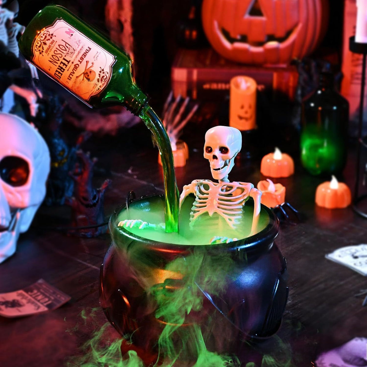 Witch bucket variant: small black cauldron with a skeleton in green mist and a bottle pouring, in a Halloween scene