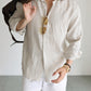 Pure linen long sleeve shirt side profile showing relaxed Italian collar and sleeve drape