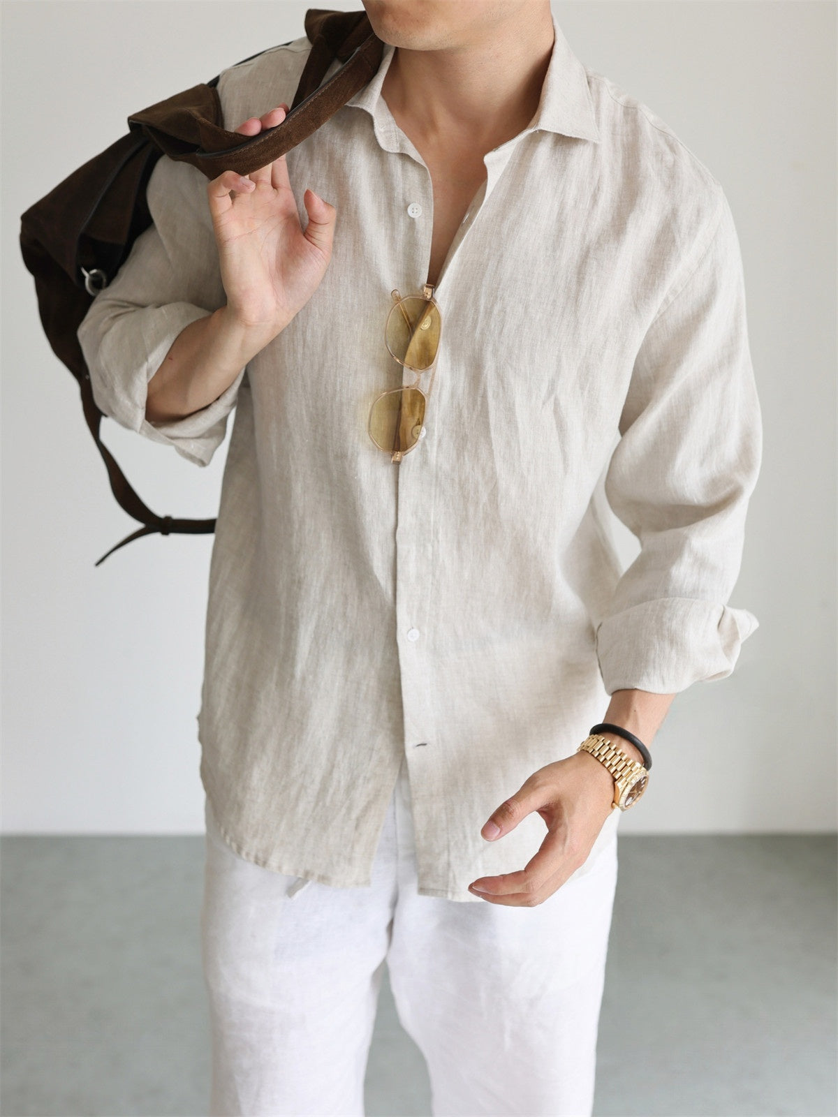 Pure linen long sleeve shirt side profile showing relaxed Italian collar and sleeve drape