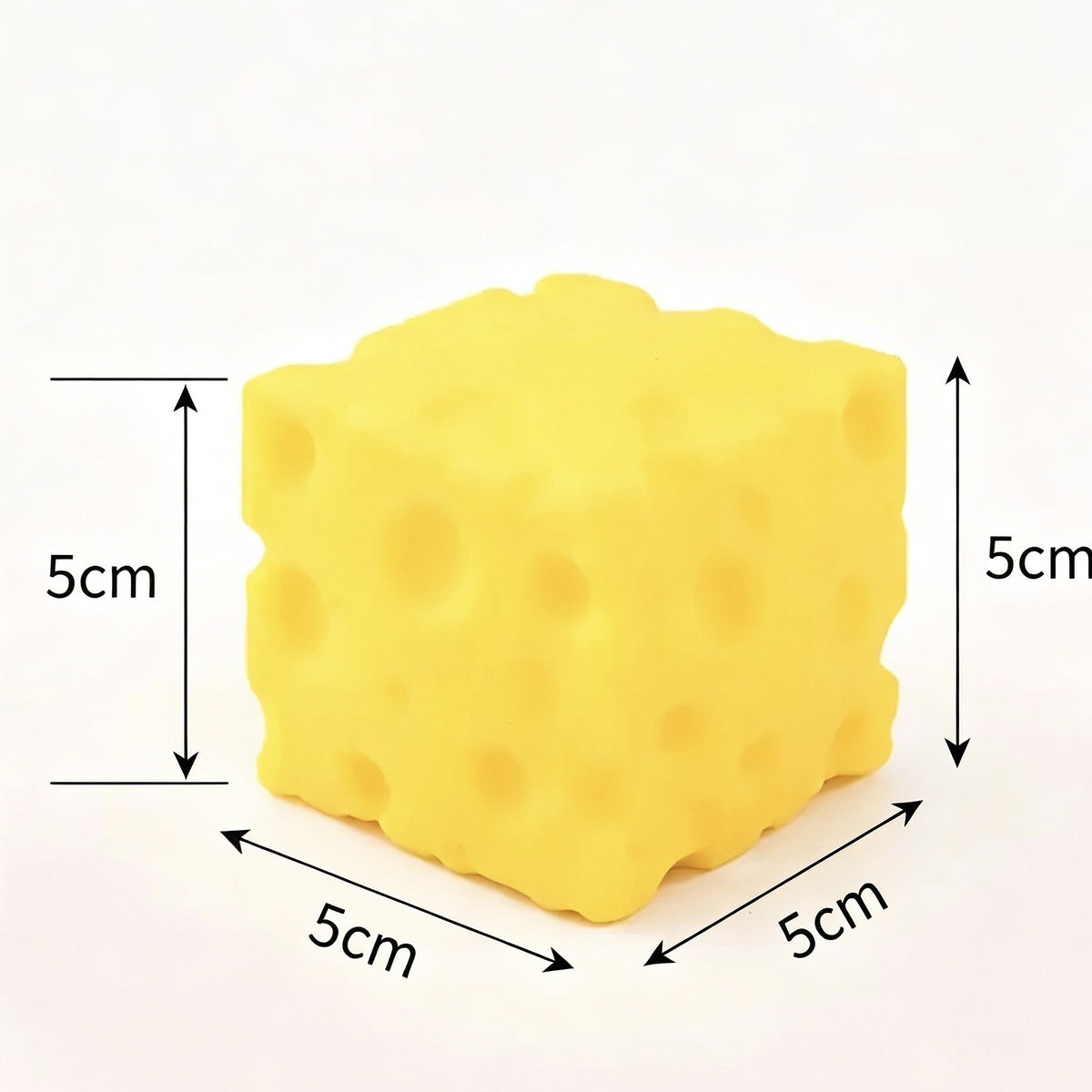Yellow cheese block squishy toy with a size diagram showing 5 cm on each side