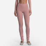 Yoga set shown in black, wrap top leggings and wrap skirt