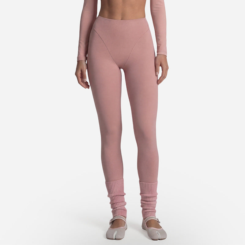 Yoga set shown in black, wrap top leggings and wrap skirt