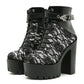 Womens platform ankle boot with round toe and a thick lug platform sole, studio shot