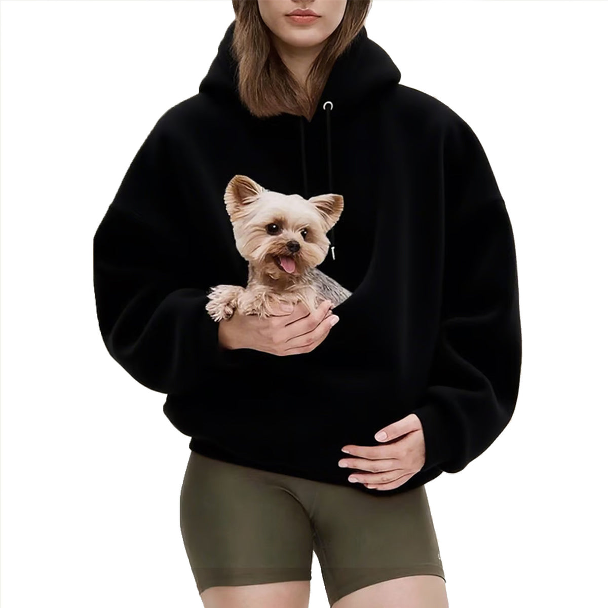 Model holding a small dog inside the pouch of the brown plush fleece hoodie