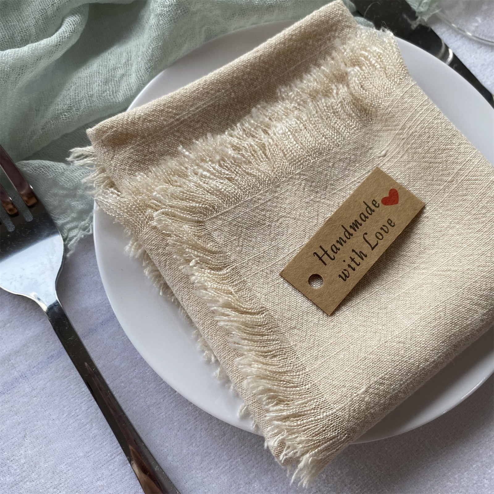 Cotton linen napkin set at a place setting during an everyday meal