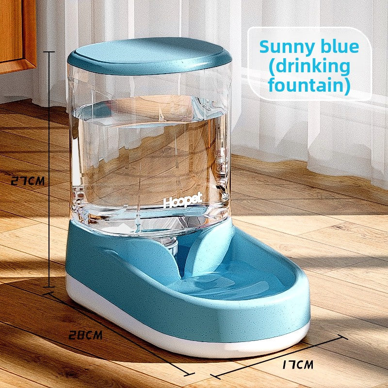 Cream yellow gravity pet feeder and waterer shown on a wood floor