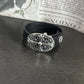 Reverse view of the black leather cuff showing the back of the strap