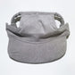 Yellow corduroy pet baseball cap on a corgi with the brim shading the eyes