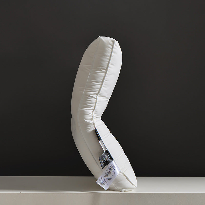Contour low microfiber pillow from the side showing the gentle dipped centre