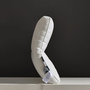 Contour low microfiber pillow from the side showing the gentle dipped centre