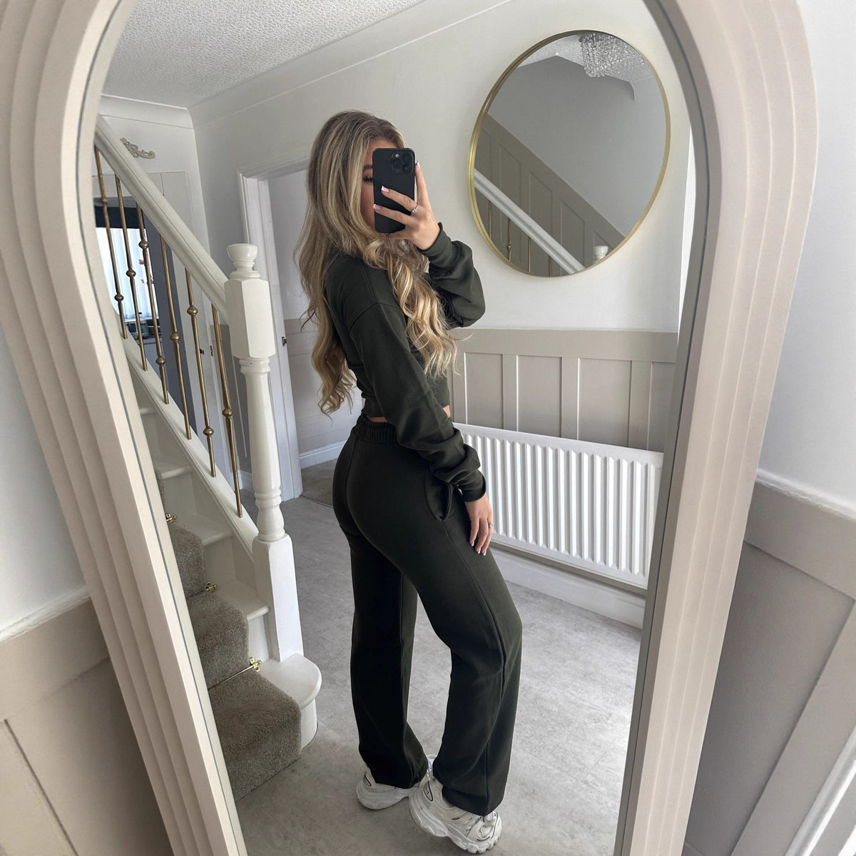 Womens two piece lounge set, a front zip jacket and straight leg drawstring pants in a soft sweat knit