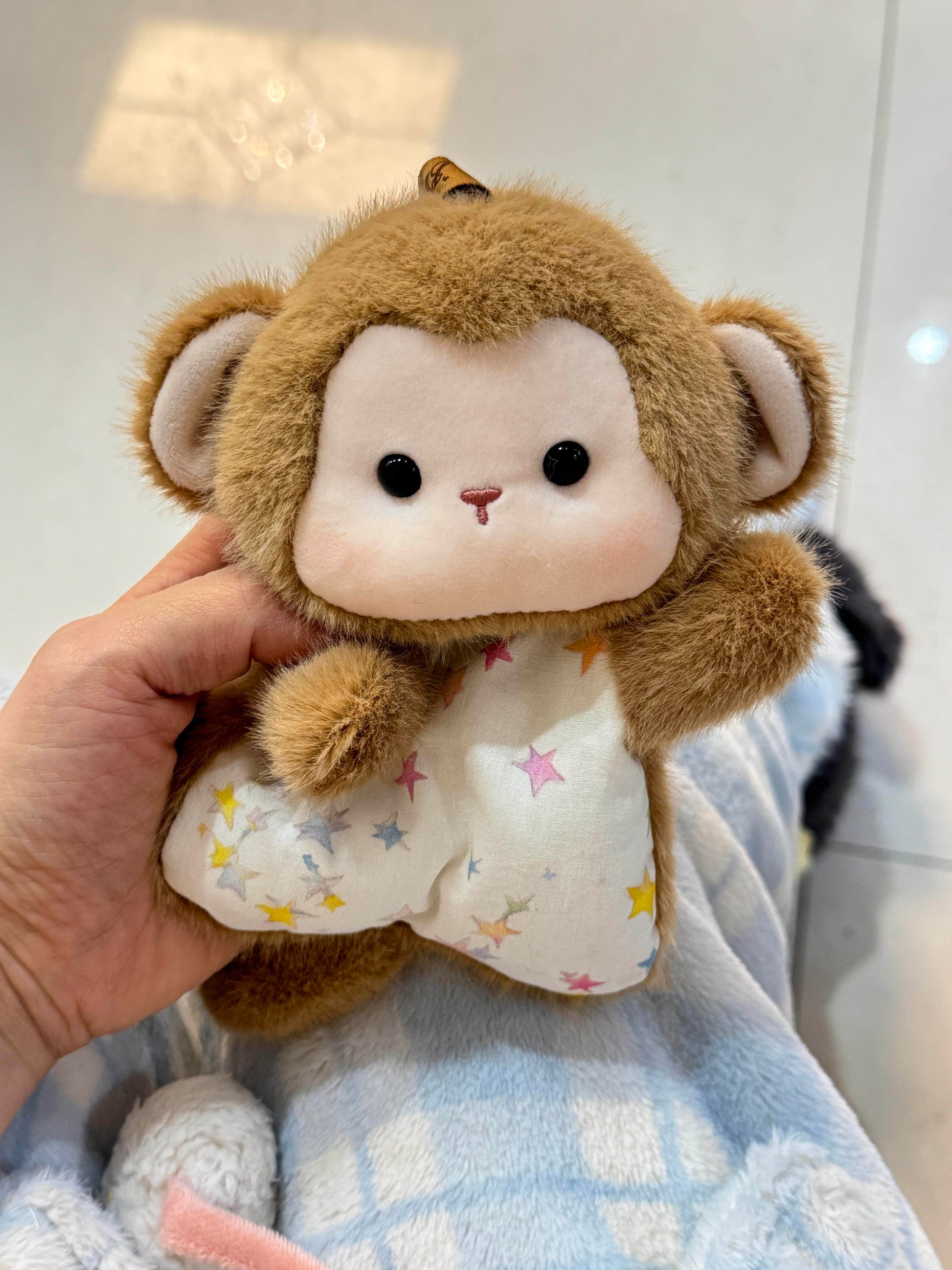Palm sized squishy bean bag plush animal toy, soft faux fur head and printed cotton apron