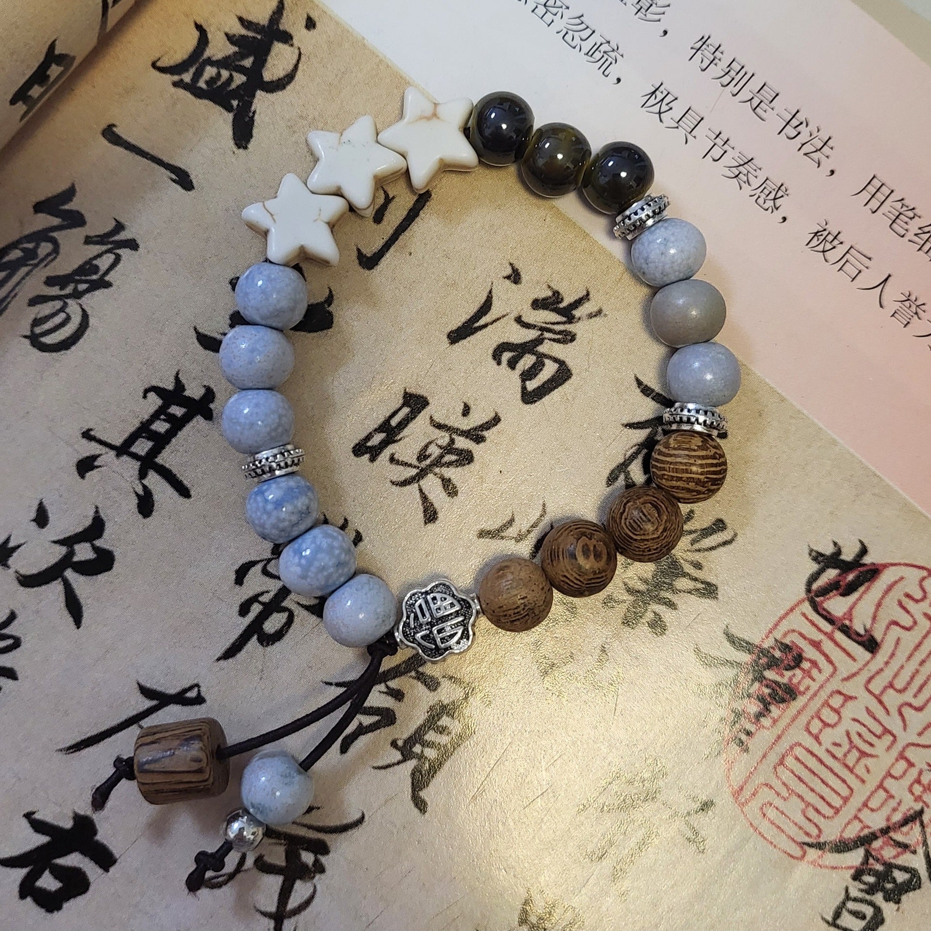 Handmade Ceramic Beads Strand | vertical hero composition