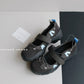 Gray brown platform slip-on shoes with a wide strap, light blue accents and a black lug sole, EU size 38 option